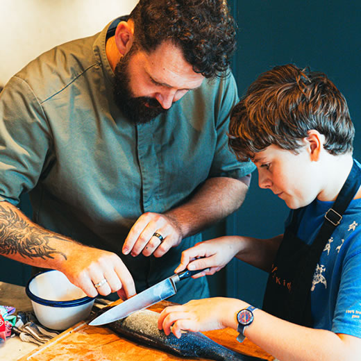 Een bakje van chef-kids wat gevuld is met een heerlijk gerecht
